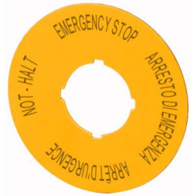 Gelbes Schild mit Aufschrift 'EMERGENCY STOP' in mehreren Sprachen, weist auf Not-Halt-Funktion hin. Rund, mit zentraler Aussparung.