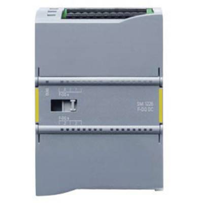 Ein grauer elektrischer Schaltschrank oder Modul mit mehreren Anschlüssen, möglicherweise für industrielle Steuerungssysteme.