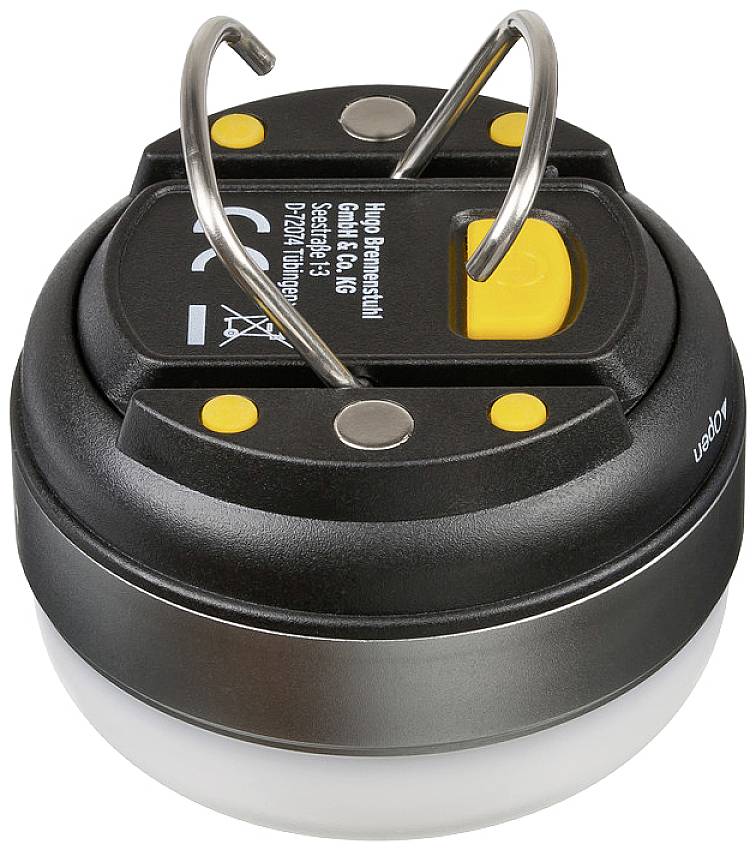 Eine schwarze, runde LED-Lampe mit zwei Metallhaken zum Aufhängen. Textaufdruck: 'Hugo Brennstuhl GmbH & Co KG, Sicherheit - IP 43'.