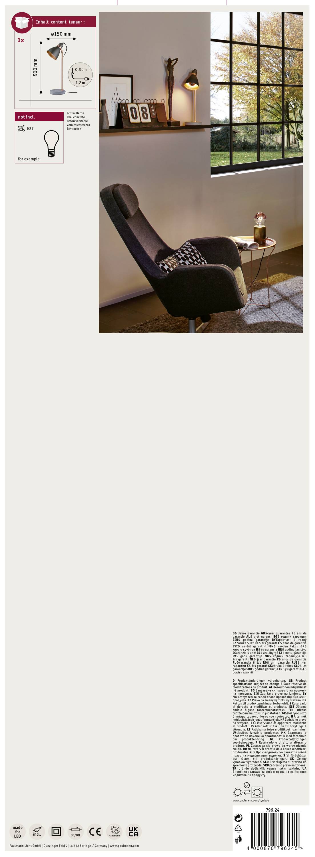 Auf der Verpackung ist eine Leselampe abgebildet, die neben einem Sessel steht. Im Fenster spiegelt sich eine Herbstlandschaft wider.