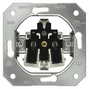 Lichtschalter-Einsatz von Siemens in rechteckigem Metallrahmen, mit Schraubenlöchern an den Ecken und zentralem Schaltermechanismus.
