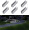 'Sechs Aluminiumprofile oben; beleuchteter Gartenweg mit Steinrand unten. Dämmerungsszene mit Pflanzen im Hintergrund.'