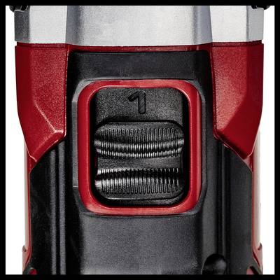Nahaufnahme eines Schalters an einem technischen Gerät. Der Schalter hat eine Einstellung mit der Nummer '1' und befindet sich in einem Gehäuse mit roten und schwarzen Details.