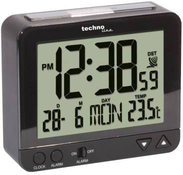 Digitale Tischuhr zeigt 12:38 Uhr, Temperatur 23,5°C, Datum 28. Juni, Montag. Knöpfe für Uhr, Alarm und Licht.