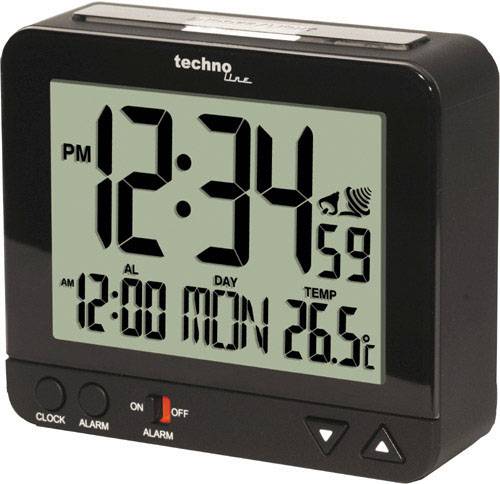 Schwarzer digitaler Wecker zeigt '12:34 PM'. Unten: 'AL 12:00 MON, Temp 26.5°C'. Tasten für Alarm und Uhrzeit sind sichtbar.