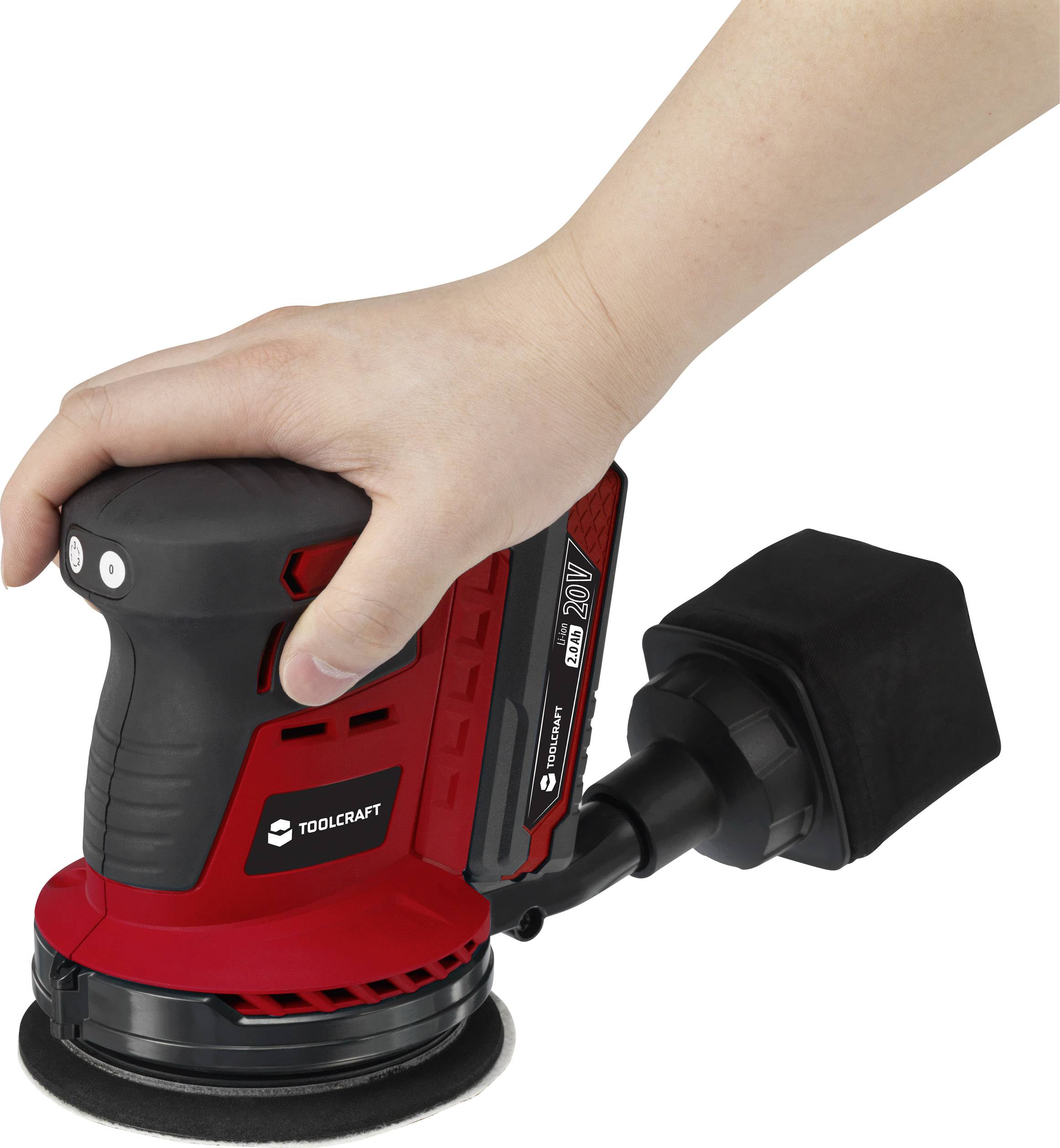 Eine Hand bedient einen roten elektrischen Schleifer von Toolcraft, angetrieben durch eine 20V Lithium-Ionen-Batterie.