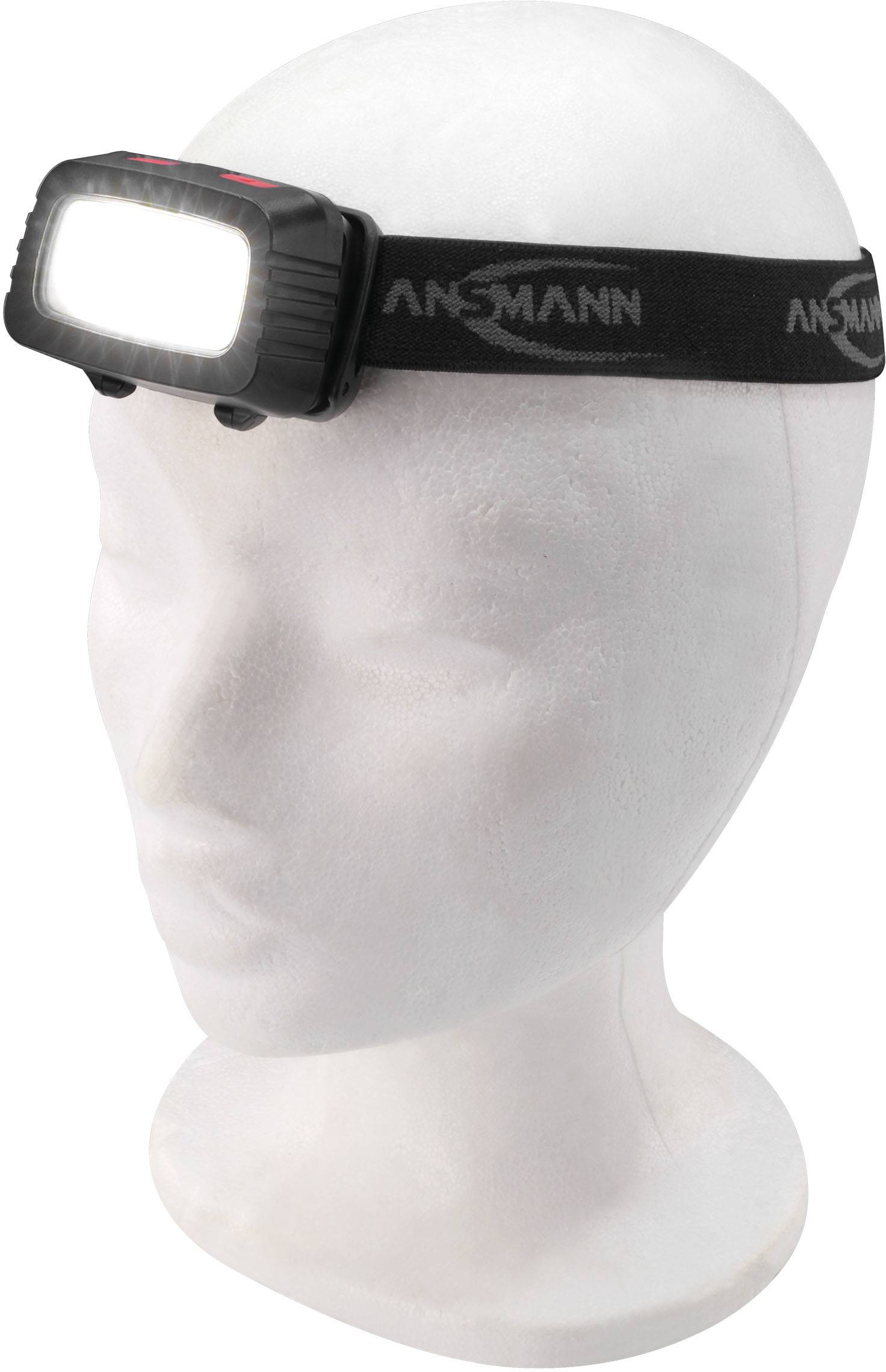 'Mannequinkopf mit angeleuchteter Stirnlampe von Ansmann.'