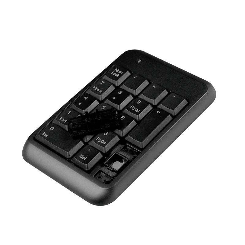 Numerisches Tastenfeld mit fehlenden Tasten, auf weißem Hintergrund. Tasten für Eingabe beschädigt, was die Funktionalität beeinträchtigt.