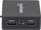 Ein schwarzer HDMI-Splitter mit der Beschriftung 'manhattan'. Zwei HDMI-Ausgänge sind mit 'Output 1' und 'Output 2' gekennzeichnet.