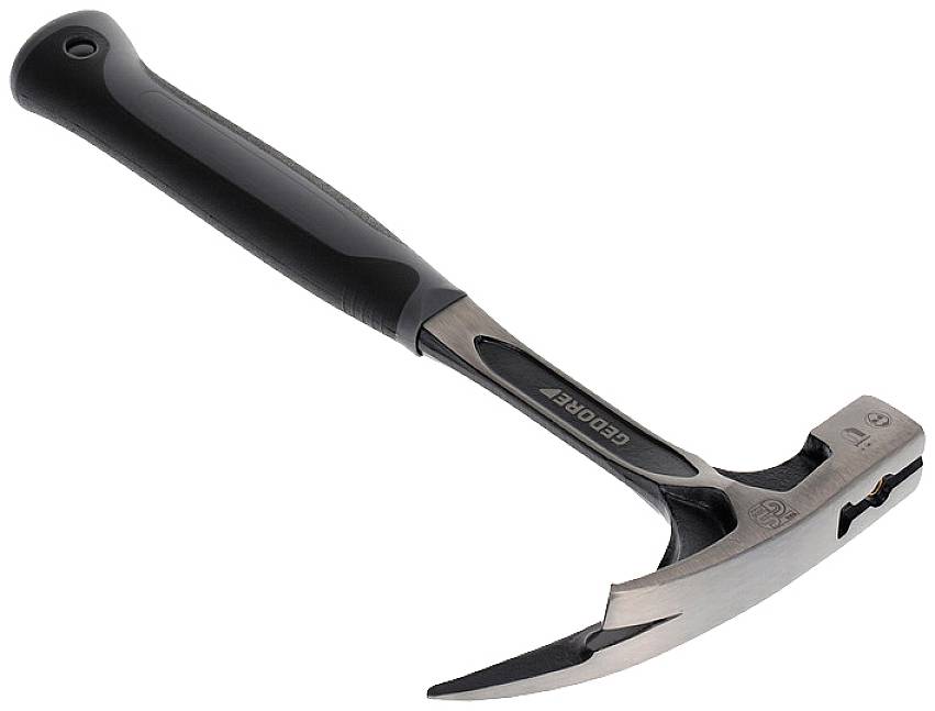 Ein silberner Geologenhammer mit schwarzem Griff liegt schräg. Der Hammer hat eine spitze Kante zum Brechen von Gestein.