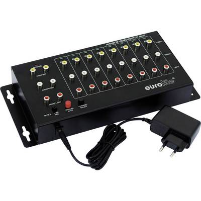 'Eurolite AVS-801 Videoswitch' mit mehreren Audio- und Videoanschlüssen, Netzadapter daneben. Gerät zur Signalumschaltung.