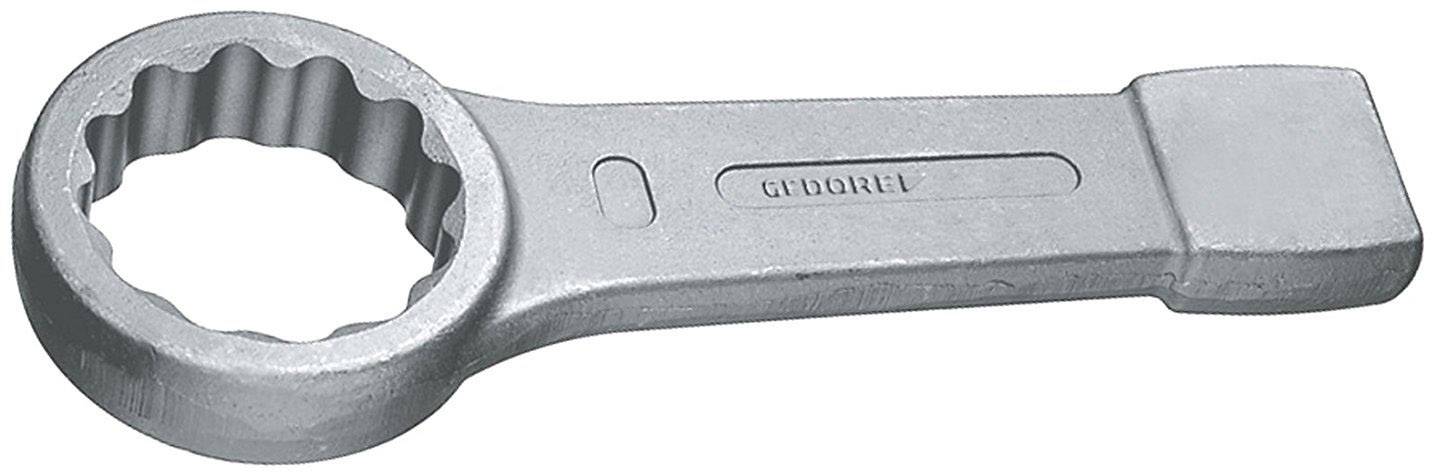 Ein silberfarbener Ringschlüssel aus Metall mit einem breiten Griff und einer runden gezahnten Öffnung für spezielle Schraubverbindungen.