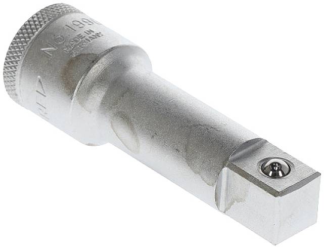 Ein silberner Spezialwerkzeugadapter mit gerändeltem Griff und rechteckiger Basis. Verwendet in Mechanik oder Maschinenbau.
