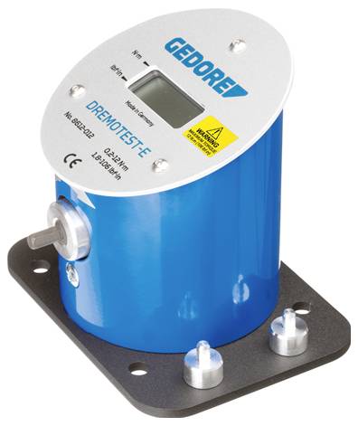 Blauer Industriesensor oder Durchflussmesser mit digitalem Display und "GEDOREX"-Branding auf einer schwarzen Grundplatte montiert.
