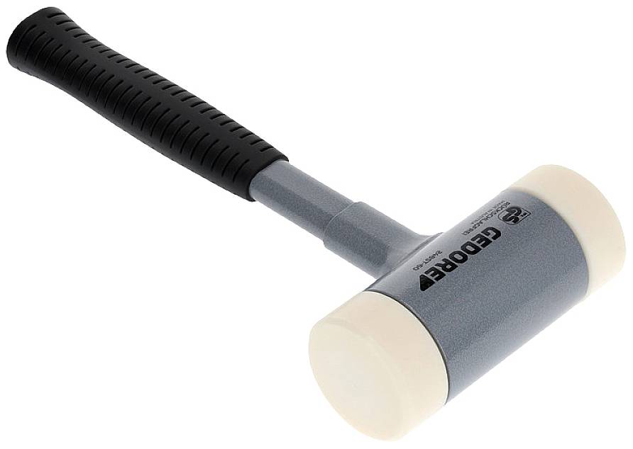 Ein grauer Gummihammer mit schwarzem Griff, der für sanfte Arbeiten genutzt wird, um Oberflächen ohne Beschädigung zu bearbeiten.