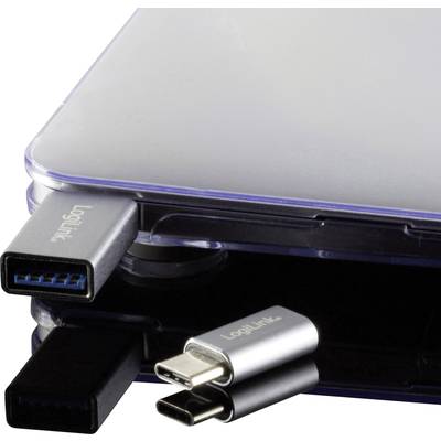Mehrere USB-Anschlüsse in einem Laptop: Typ-A und Typ-C Steckplätze, die für Peripheriegeräte oder Datentransfers genutzt werden können.