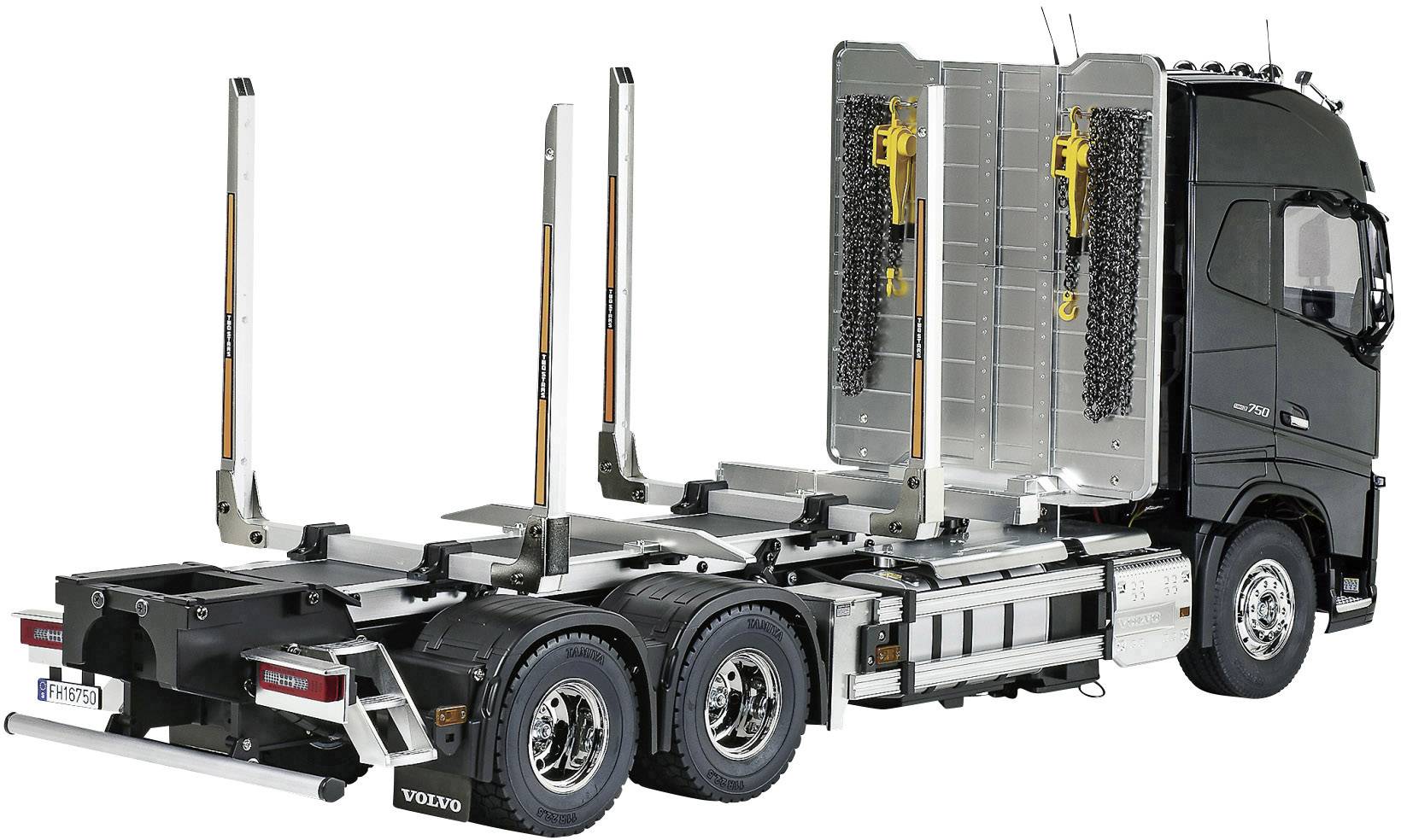 Lkw ohne Anhänger mit starker Metallrahmenkonstruktion für den Holztransport, schwarze Fahrerkabine, sichtbares Nummernschild.