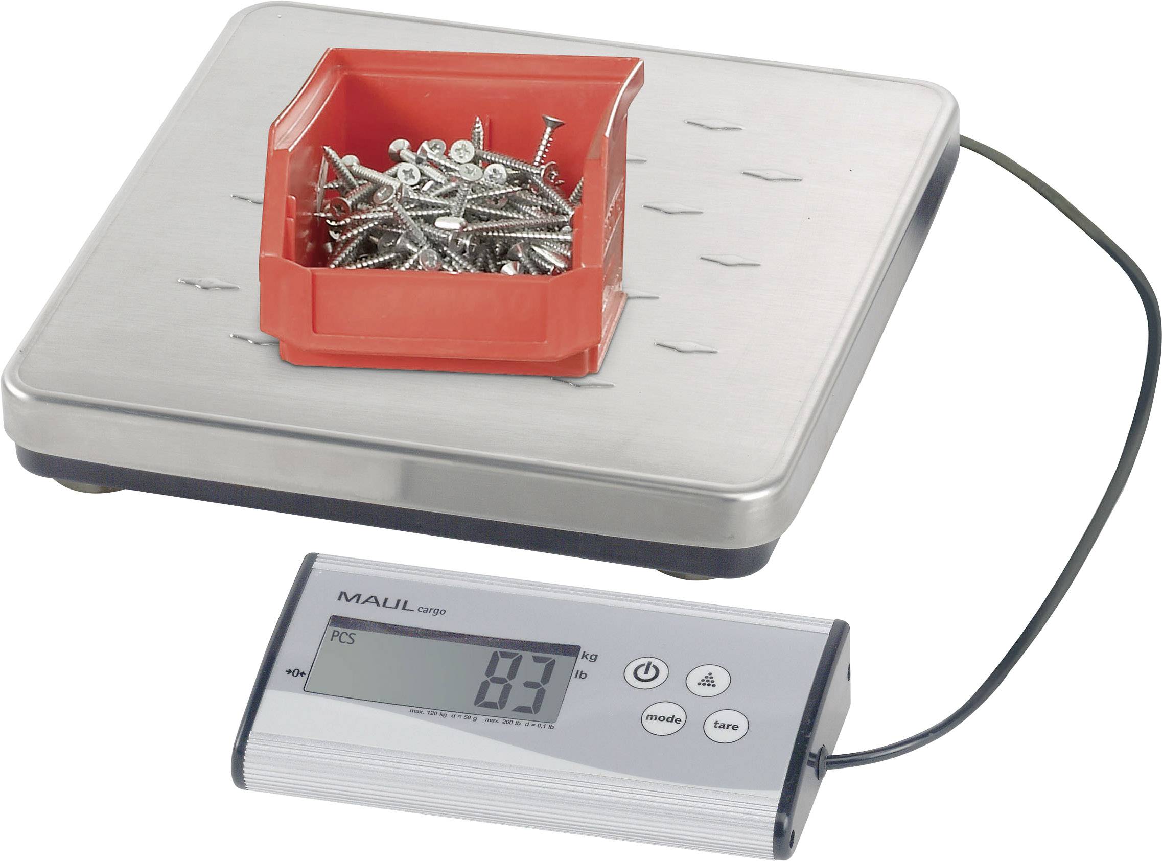 Rote Plastikbox mit Schrauben auf einer elektronischen Waage. Display zeigt '83 g'.