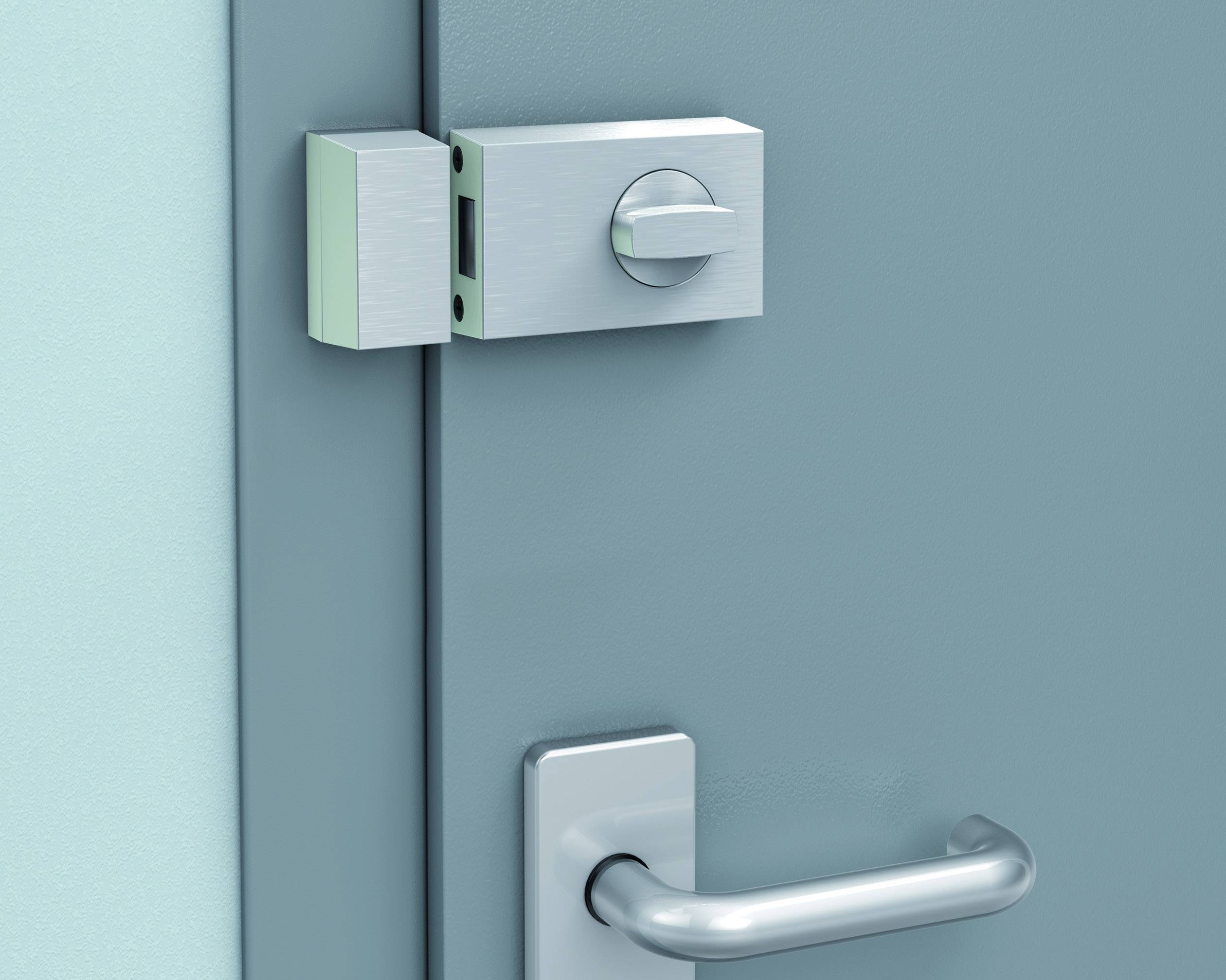 installiertes Türzusatzschloss mit Drehknauf