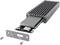 Externer SSD-Gehäuseadapter mit herausragendem Steckplatz für eine NVMe-SSD; Typ-C-Anschluss und zwei Schrauben zur Befestigung.