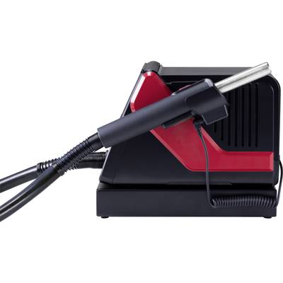 Ein schwarzes und rotes elektrisches Gerät mit Handgriff und Schlauch, wahrscheinlich ein Reinigungs- oder Haushaltsgerät.
