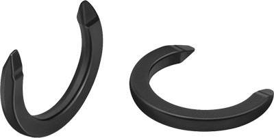 Zwei schwarze Hufeisen, eines aufrecht stehend und eines flach liegend, symbolisieren Glück und Schutz.