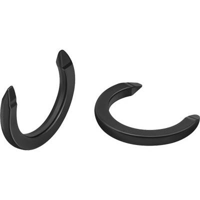 Zwei schwarze Hufeisen, eines aufrecht stehend und eines flach liegend, symbolisieren Glück und Schutz.