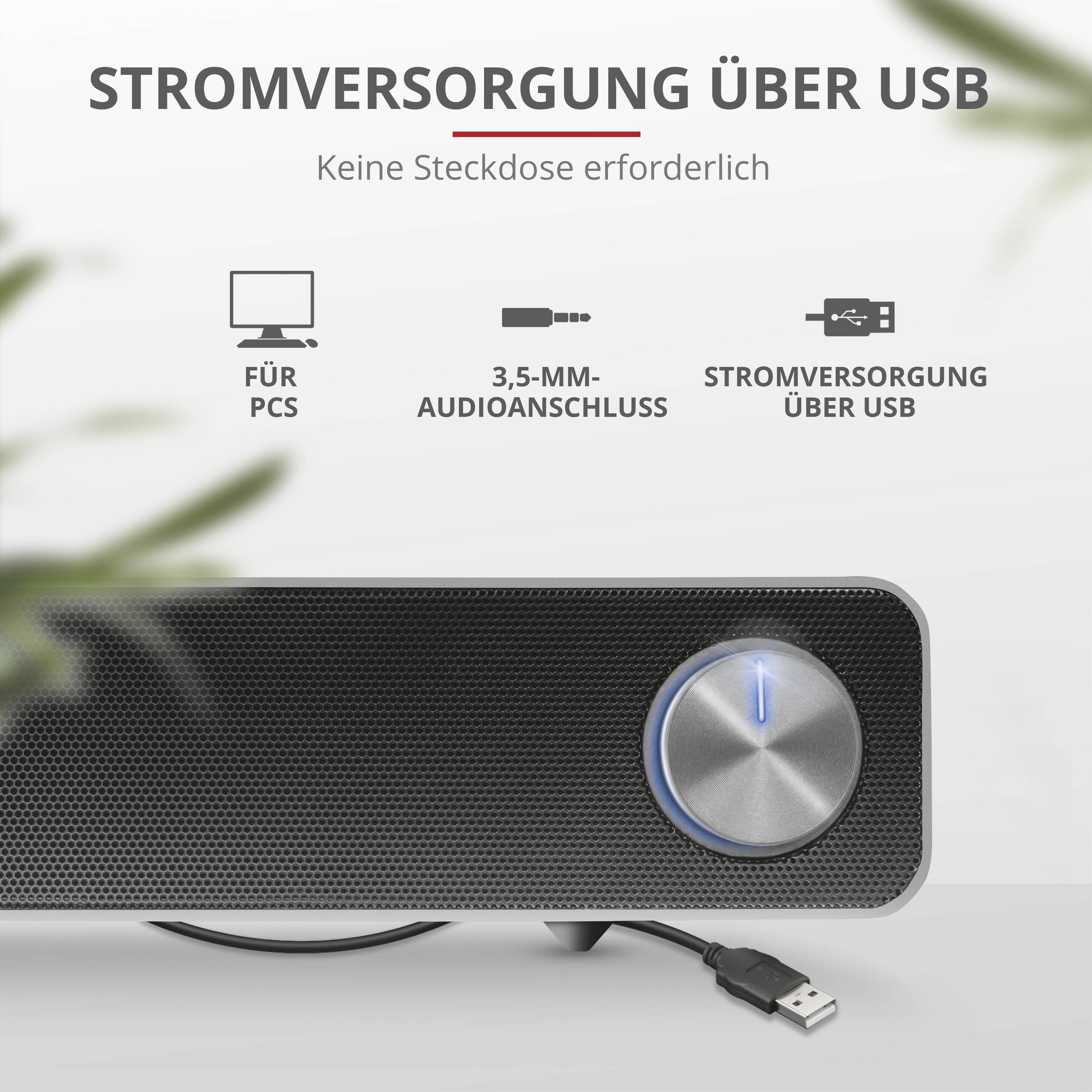 Ein externer Lautsprecher mit USB-Stromversorgung und 3,5-mm-Audioanschluss. Text: 'Stromversorgung über USB'. Keine Steckdose nötig.