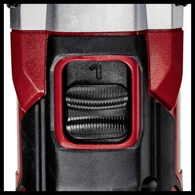 Nahaufnahme eines roten elektrischen Werkzeugs mit einem schwarzen Schalter in der Mitte, nummeriert mit '1'.