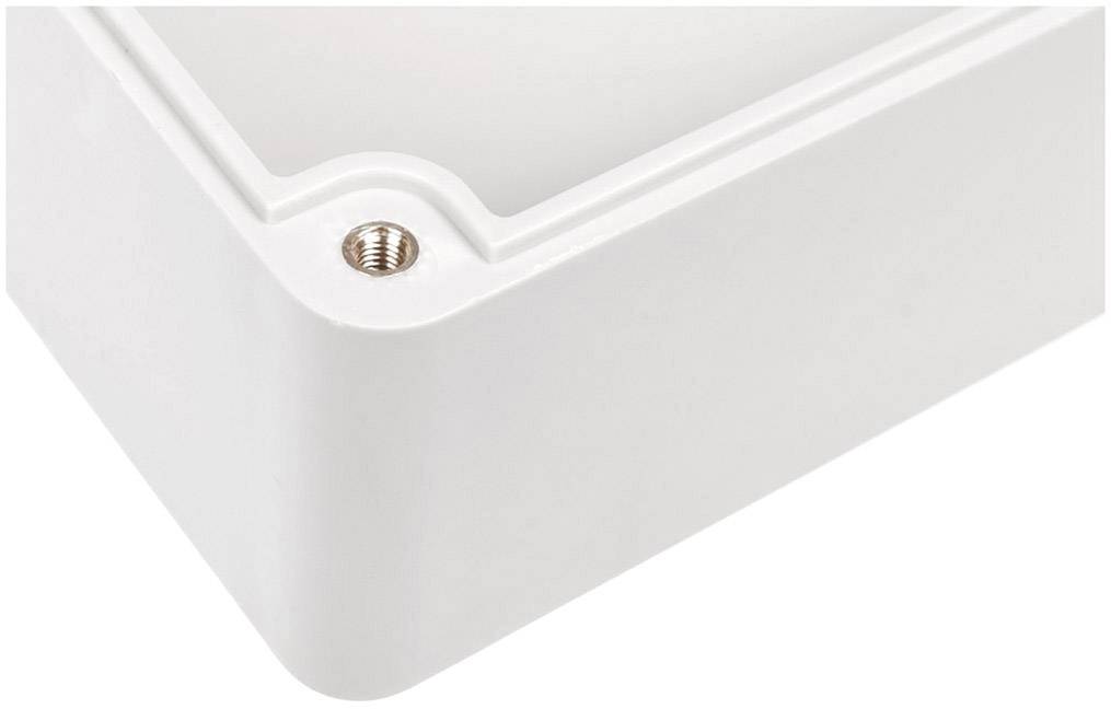 Weiße Plastikbox-Ecke, zeigt eine Schraube und glatte Oberfläche.