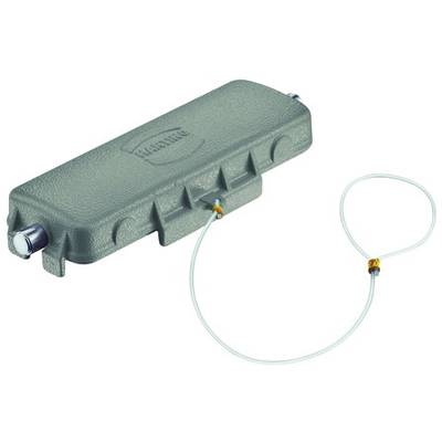 Ein grauer Kabeldämpfer mit zwei Kabelanschlüssen. Das Gerät hat eine längliche Form und ist mit einem dünnen Kabel verbunden.