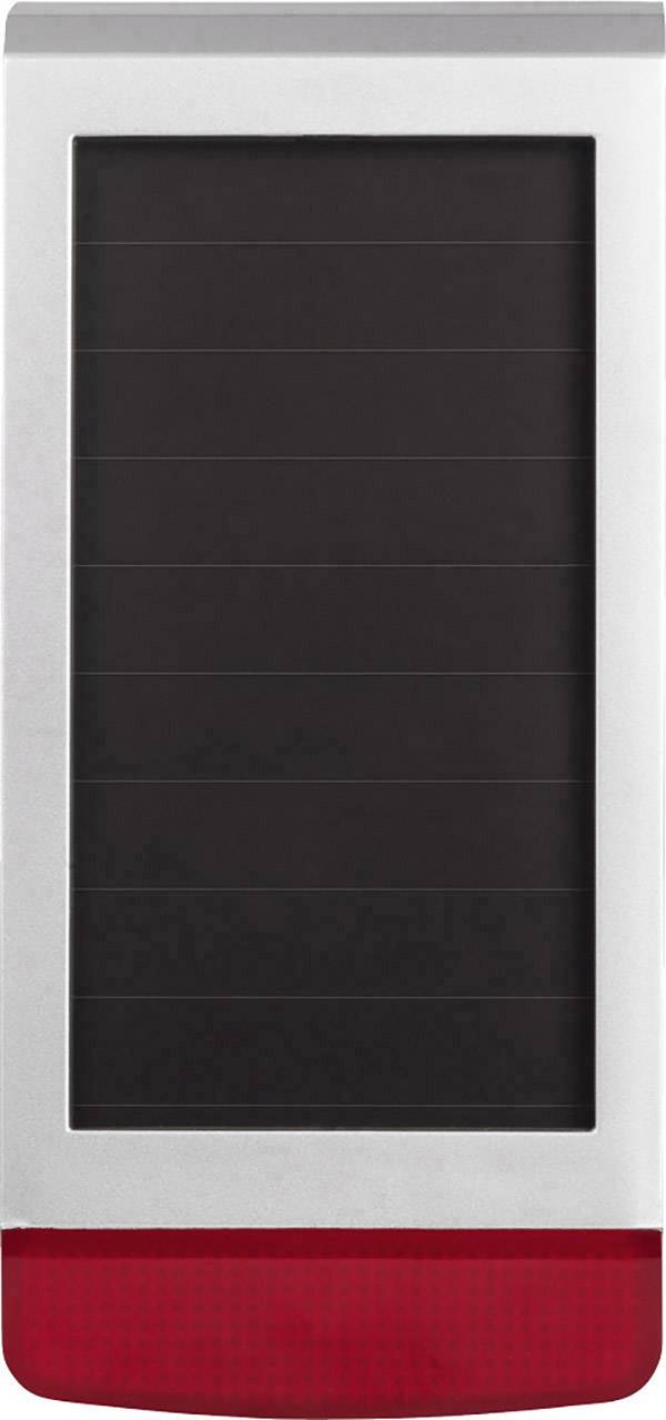 Ein rechteckiges Solarmodul mit einem silbernen Rahmen und einem roten Element an der Unterseite, möglicherweise ein Licht.