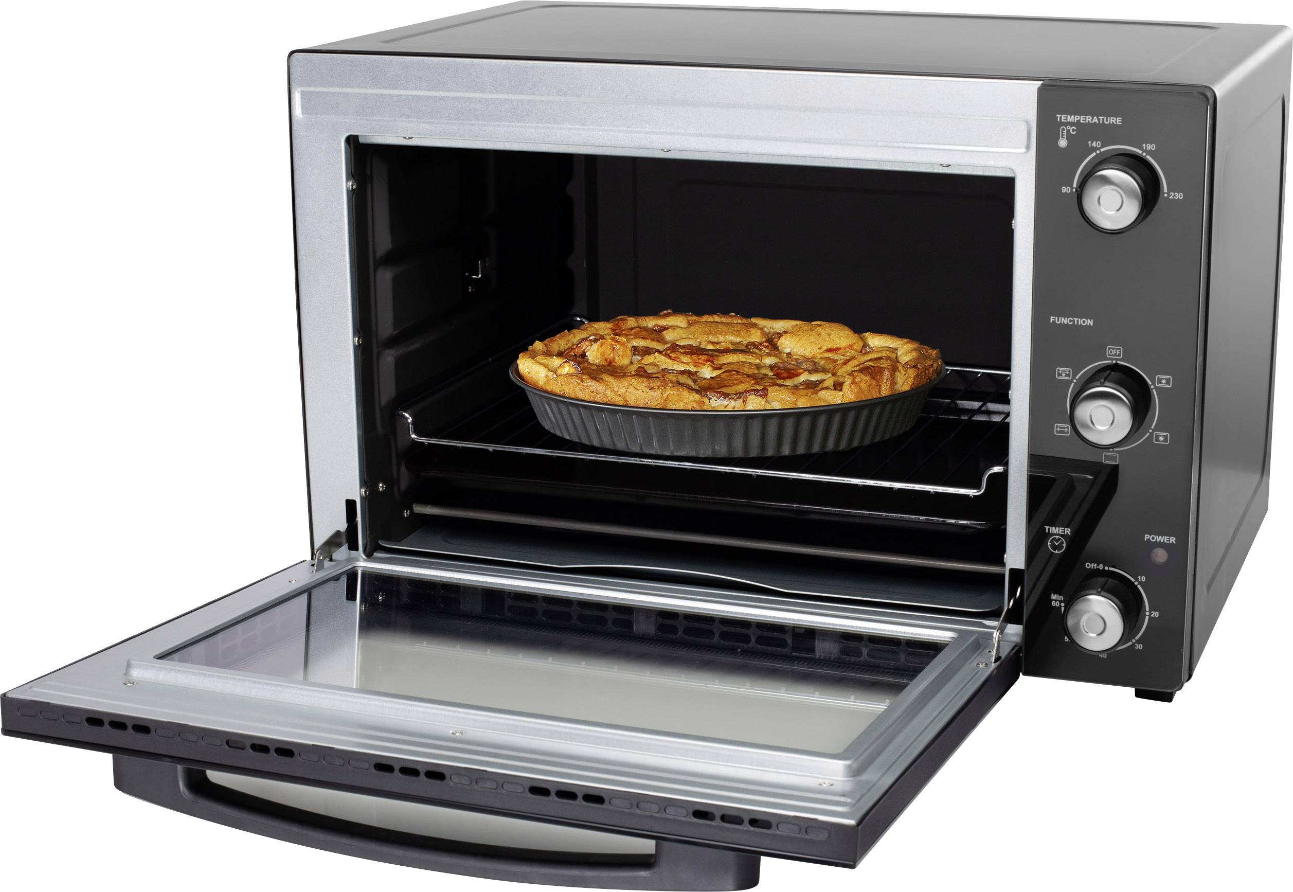 Ein geöffneter Minibackofen mit einer runden Apfelkuchenform auf dem Gitterrost. Drei Drehknöpfe für Temperatur, Funktion und Zeit.