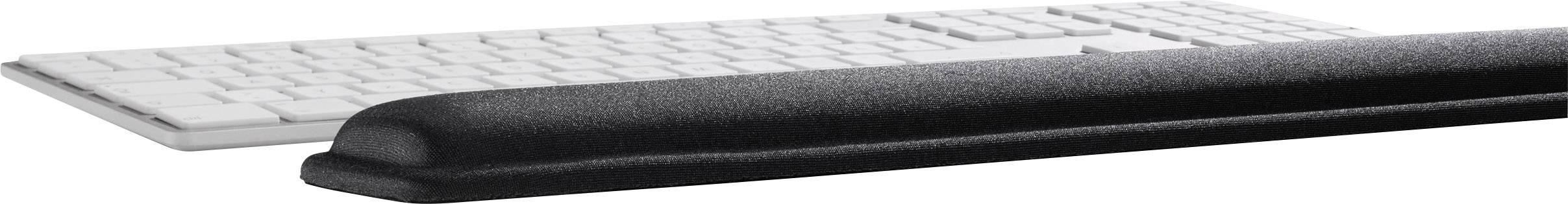 Eine flache, weiße Tastatur mit einer schwarzen, gepolsterten Handballenauflage im Vordergrund.