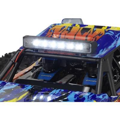 Ein ferngesteuertes Auto mit buntem Muster und leuchtendem LED-Lichtbalken auf der vorderen Abdeckung, das Detailarbeit zeigt.