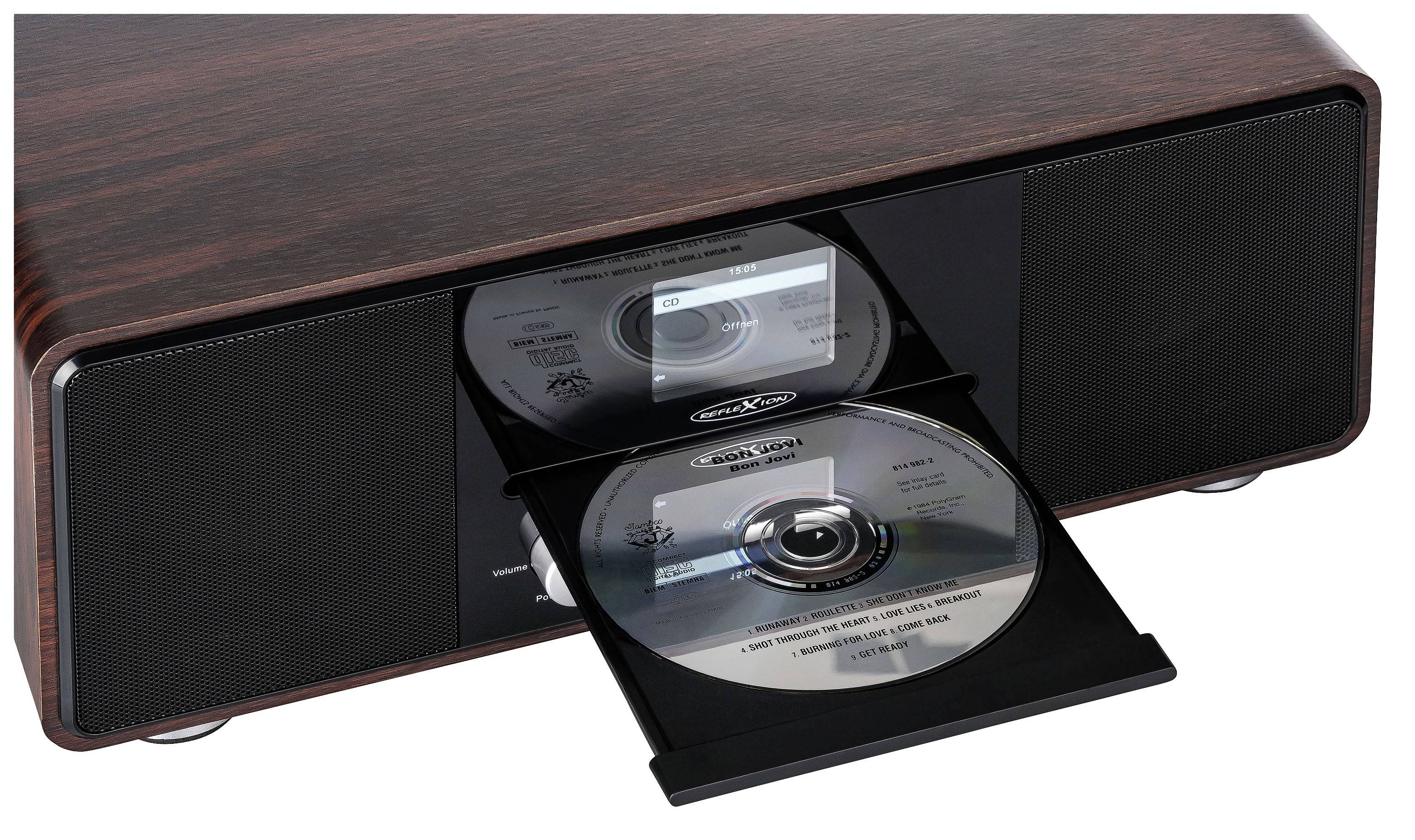 Ein moderner CD-Player mit Holzdruck, zwei CDs im Fach und einem kleinen Display.