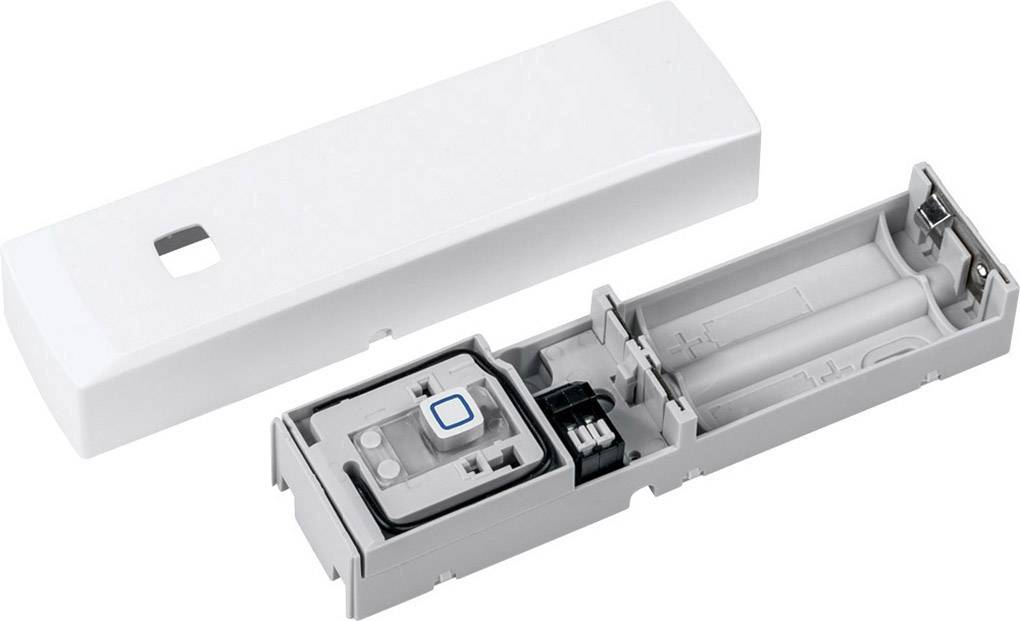 Ein geöffnetes, rechteckiges Gerät mit Batteriefach und elektronischen Komponenten; weißer Deckel daneben.