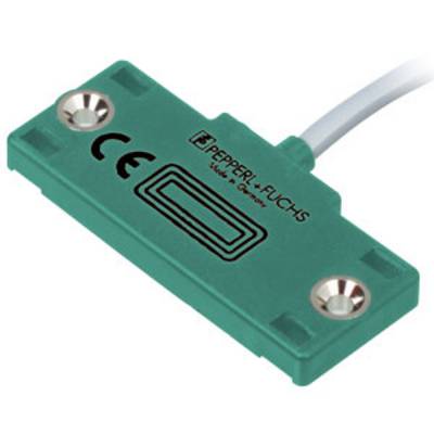 Ein grüner Sensorswitch der Firma Pepperl+Fuchs mit CE-Kennzeichnung, montierbar mit Schrauben, und einem weißen Kabelanschluss.