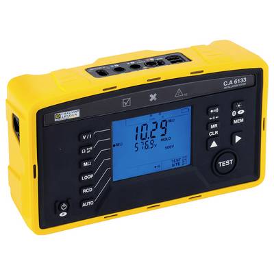 Ein gelbes elektrisches Prüfgerät mit schwarzem Display zeigt '10.29 MΩ' und '576.9 V' an. Tasten für verschiedene Mess-modus sind sichtbar.