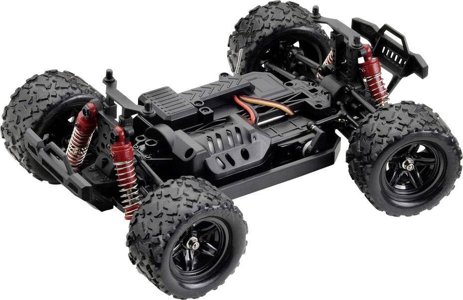 Ein ferngesteuertes Auto-Chassis ohne Karosserie, mit großen, grobstolligen Offroad-Reifen und sichtbarer Federung sowie Verkabelung.