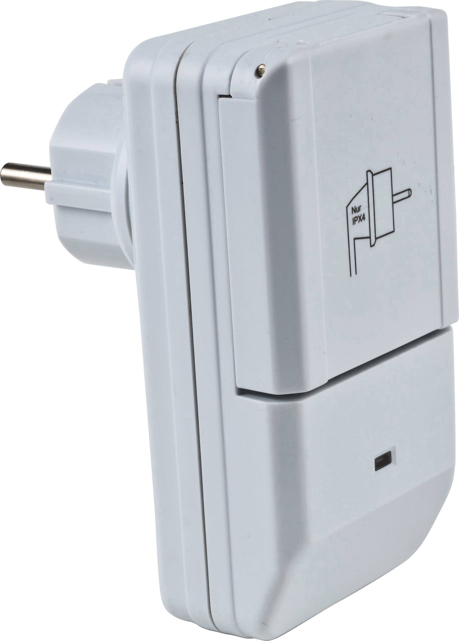 Ein grauer Steckdosenadapter mit einer Abbildung, die zeigt, wie er eingesteckt wird.