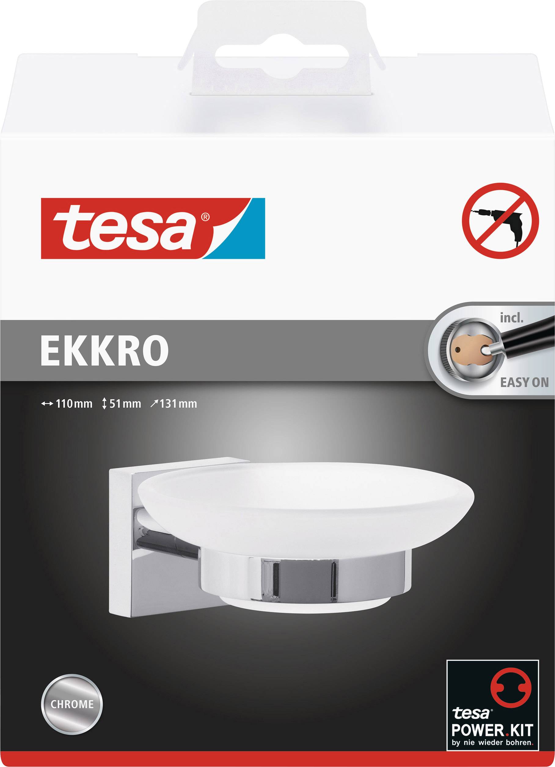 'Verpackung eines tesa EKKRO Seifenhalters, enthält Montageset ohne Bohren. Farbe: Chrom. Abmessungen: 110 mm x 51 mm x 131 mm.'