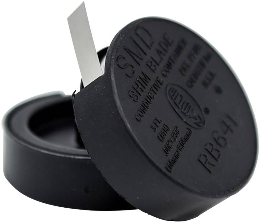 Runde schwarze Plastikverpackung mit Text 'SMD Shim Blade' und einem herausstehenden Metallstreifen. Verpackung zeigt technische Informationen.