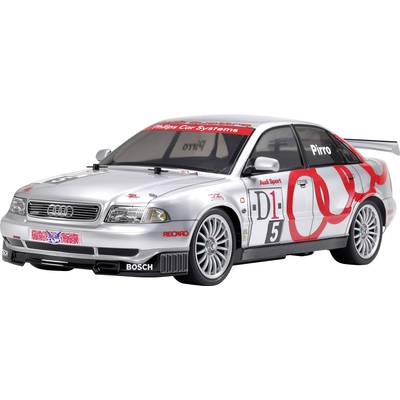 Silberner Rennwagen mit roten und schwarzen Aufklebern, Nummer 5 auf der Seite. Audi-Logo auf der Vorderseite, sportliches Design.