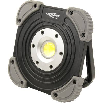 Ein tragbarer, schwarzer LED-Arbeitsstrahler mit robusten grauen Ecken und einem zentralen, hellen Leuchtmittel.