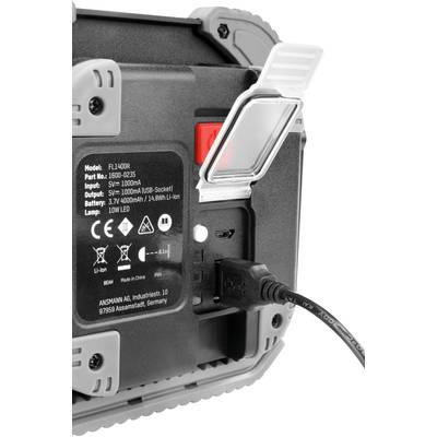 Rückseite eines tragbaren Geräts mit USB-Anschluss und Beschriftung zum Modell FL1400R, LED 10W, und Herstellerinformationen.
