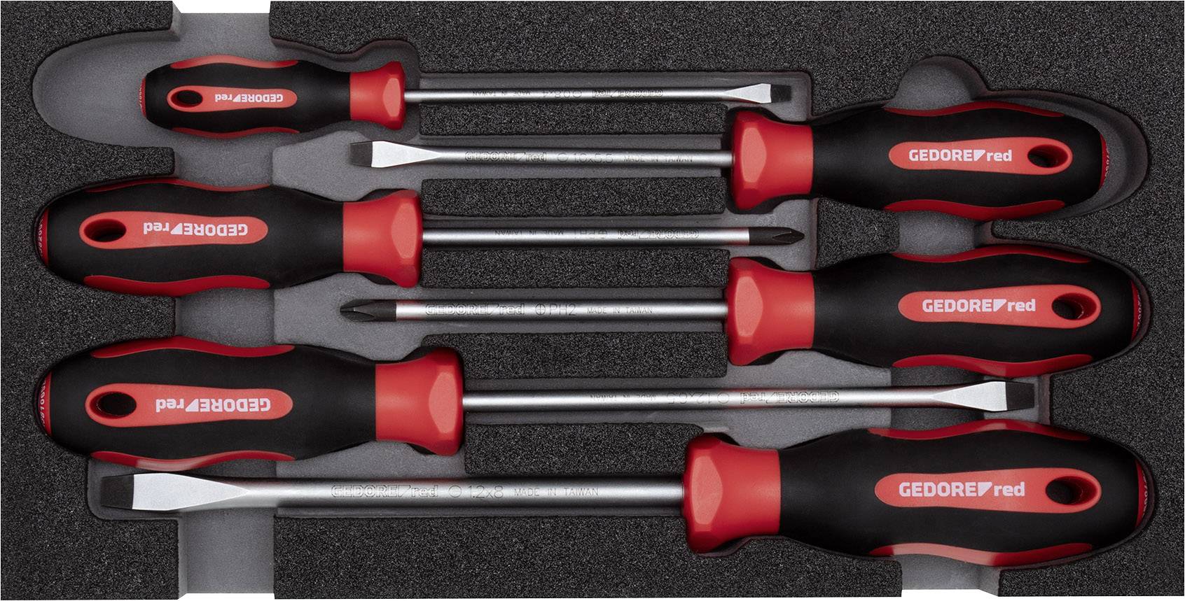 Ein Set von fünf Schraubendrehern mit ergonomischen Griffen in einem schwarzen Schaumstoffbehälter.