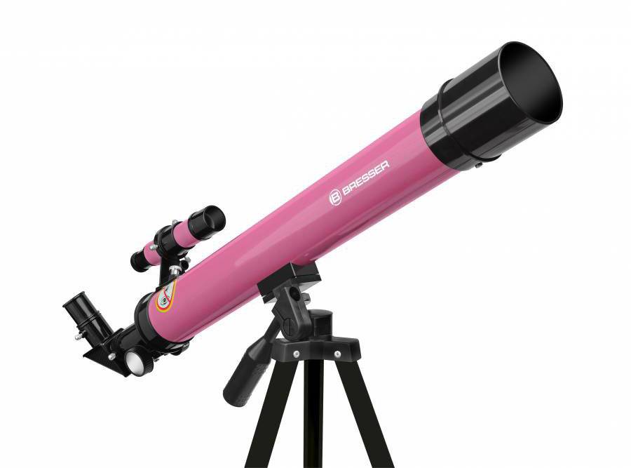 Pinkes Teleskop mit schwarzem Stativ und mehreren Linsen, geeignet für astronomische Beobachtungen.