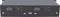 Ein schwarzes elektronisches Gerät mit zwei Kippschaltern und Sicherungsanzeigen. Es zeigt die Ein- und Ausgänge sowie Leistungsangaben.