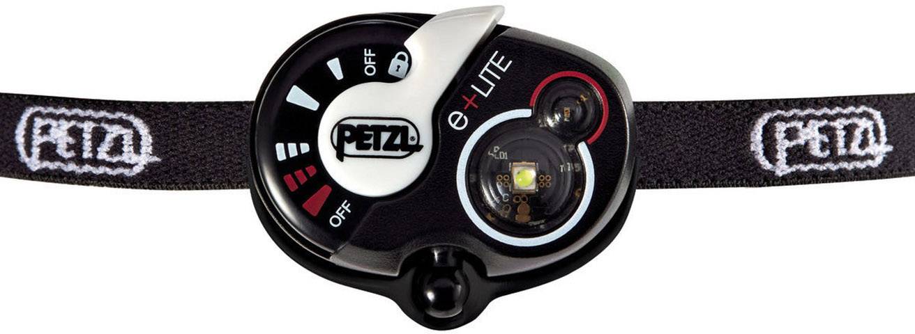Eine kompakte, schwarze Stirnlampe mit rotem und weißem Licht, Markenlogo 'Petzl', und elastischem Band. Ideal für Outdoor-Nutzung.